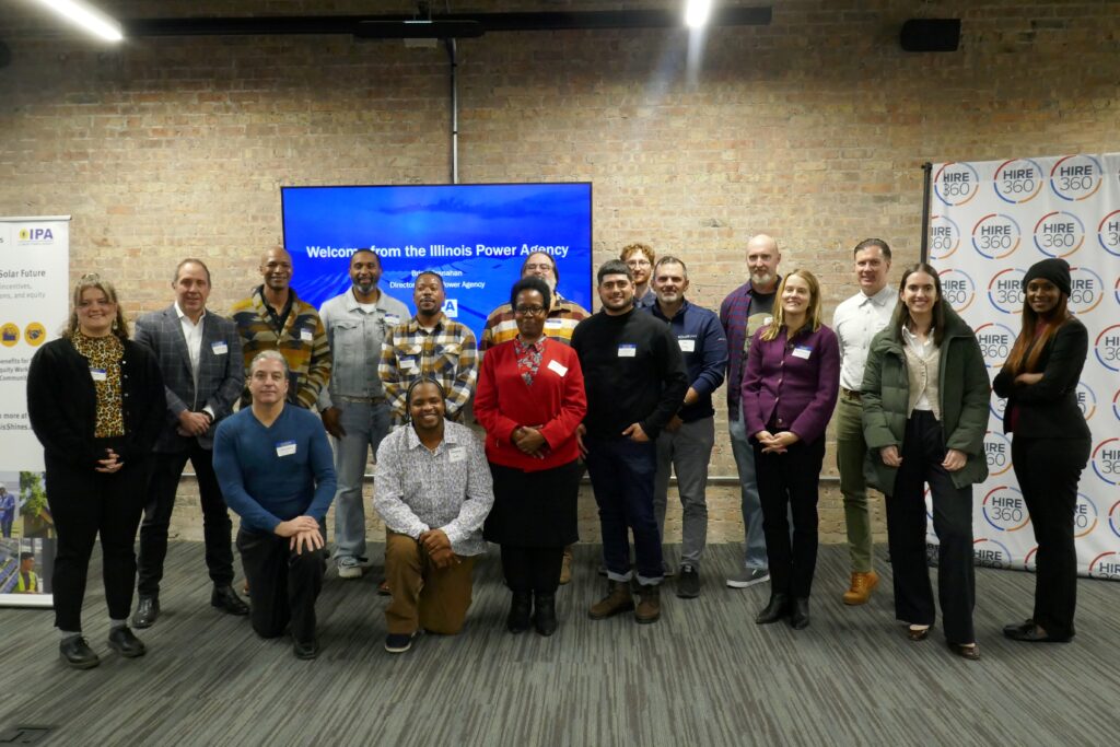 A group of mentees, mentors, and Illinois Power Agency staff posing together.